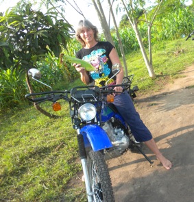 Picking fresh maize corn and sitting on my ride.